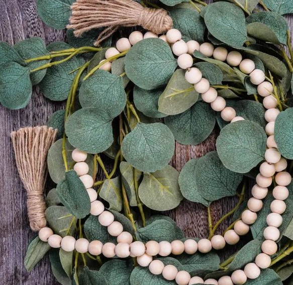 Greenery, Beads, White Stockings, and a Statement Sign