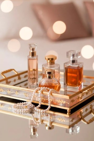 Perfume Bottles on a Mirrored Tray