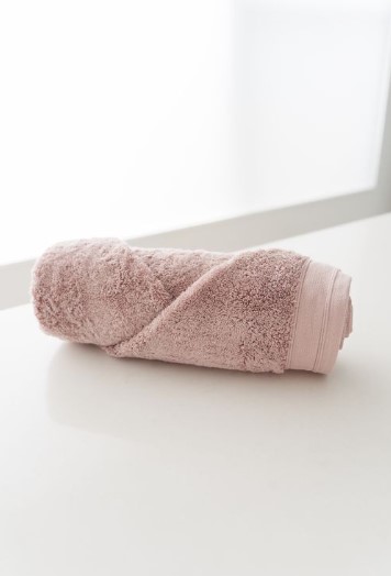  Roll Your Towels on a Simple Holder
